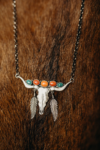 Longhorn sterling necklace with spiny oyster and turquoise stone accents.