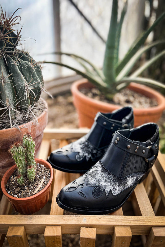 Image of the Gigi Leather Cowhide Bootie by Agave Sky.  The boots are short style. 