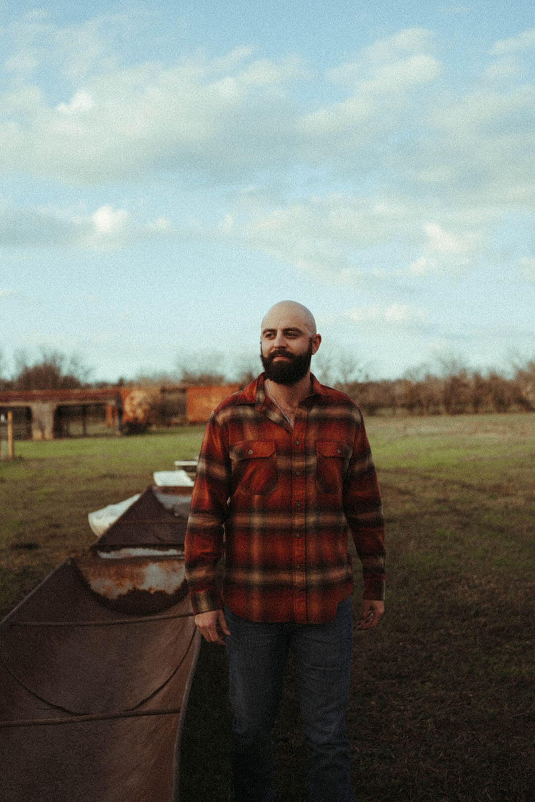 Man modeling the Burnside Flannel Pendleton Button up Shirt.  Button sleeve closure. 