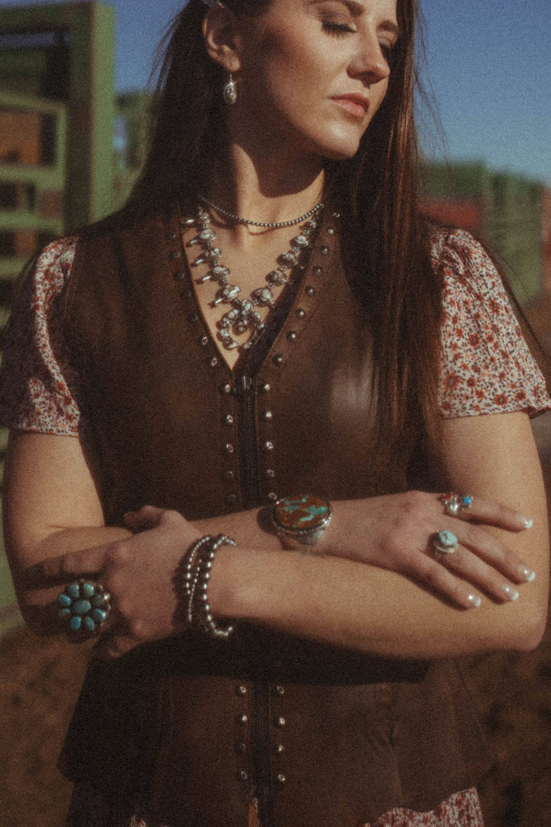 Close up image of the Cripple Creek Womens Antique Finish Stud Vest. The vest is 100% Leather and brown in color.  