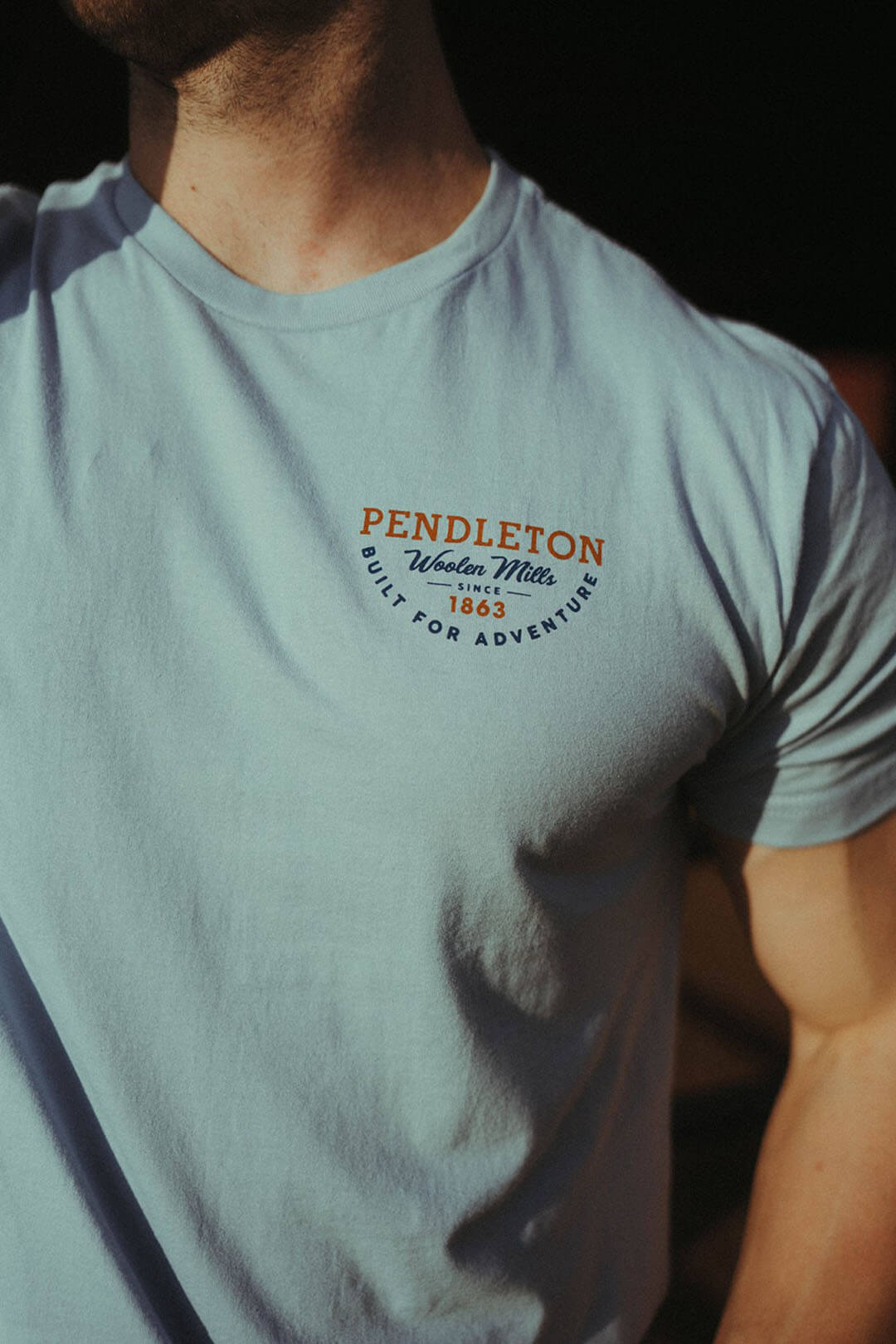 Picture showing the Pendleton logo with "woolen mills since 1863 " written on it and underneath " Built for Adventure"