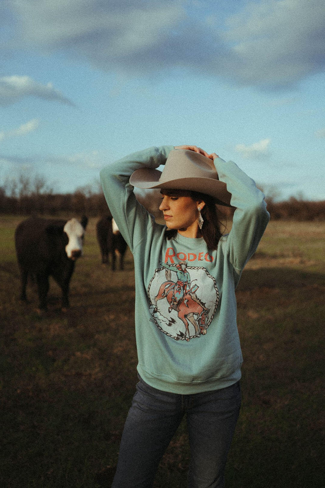 Close up image of the rodeo resist pullover .  This shirt is made in Texas by artist who sketch it out before printing.  No shirt is the same. 