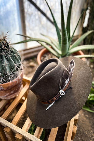 Image of the TeePee Oak Cowgirl Hat by Charlie 1 Horse sitting on a crate.  