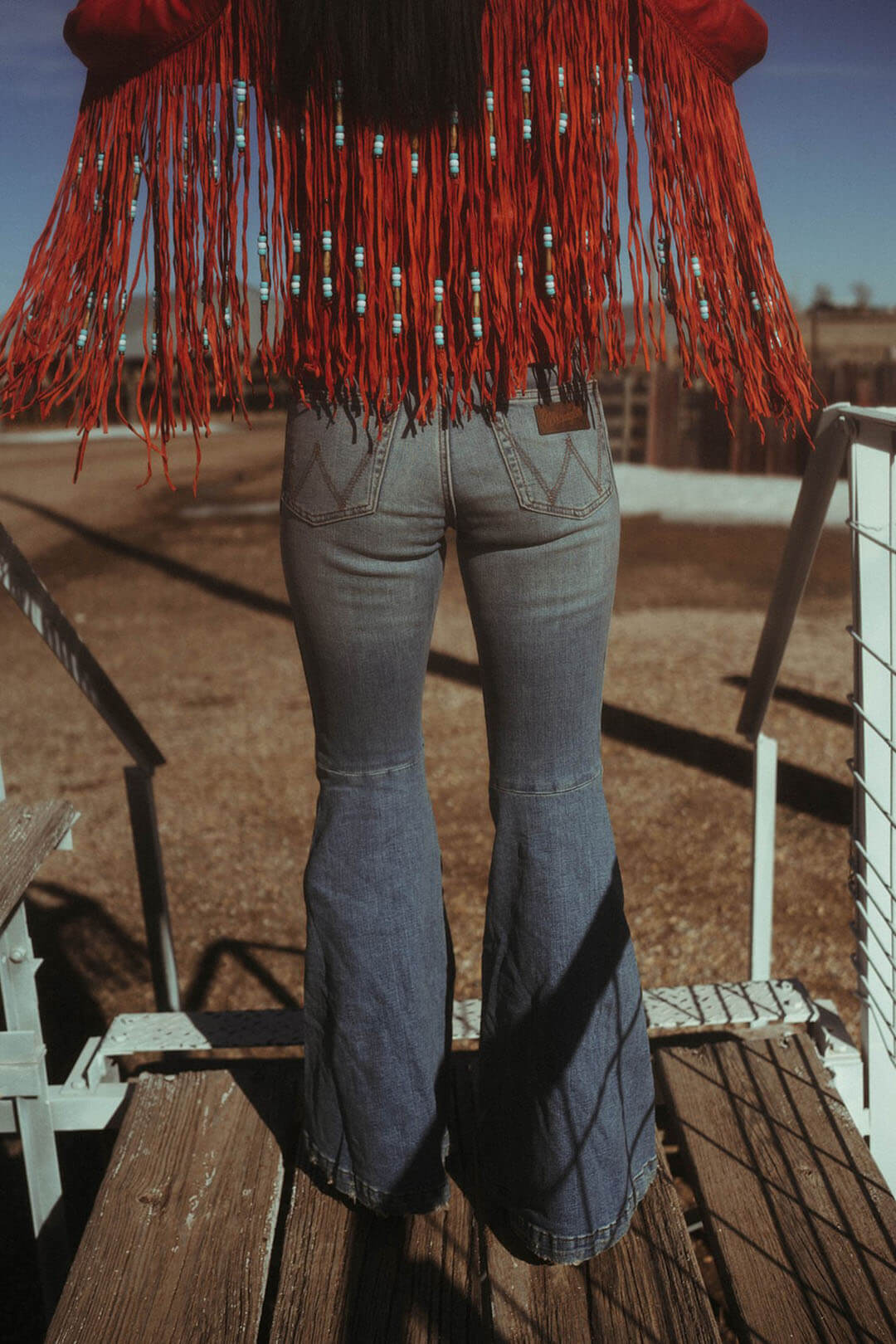 Image of the Wrangler HIgh Rise Trumpet Flare in Helen.  Features a zip fly and belt loops.