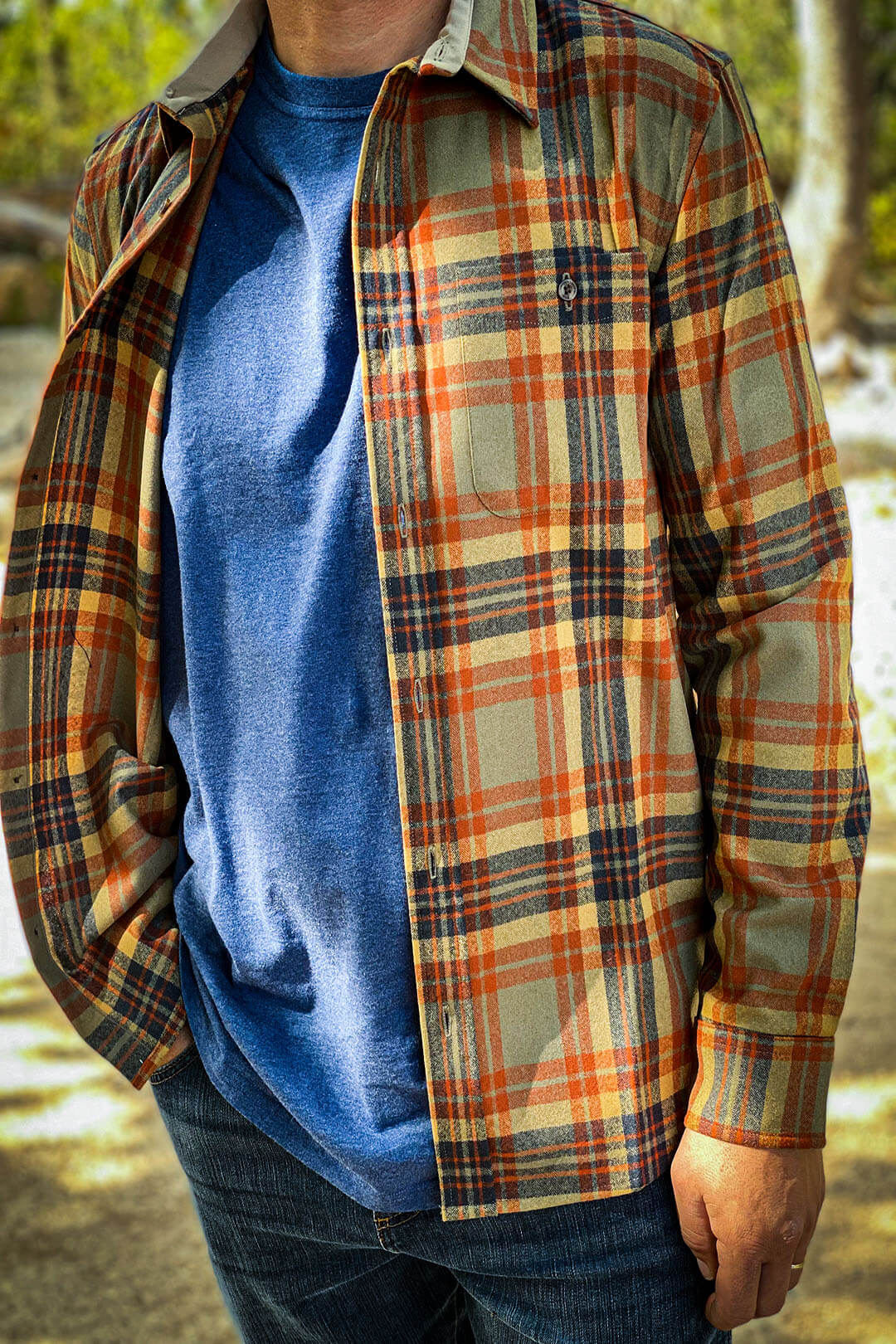 Pendleton Trail long sleeve shirt with buttons has orange mustard and navy blue striped 